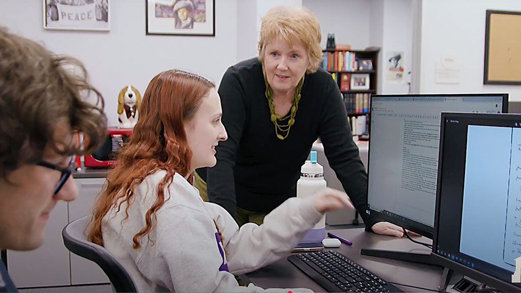 Digital Humanities professor collaborating with student