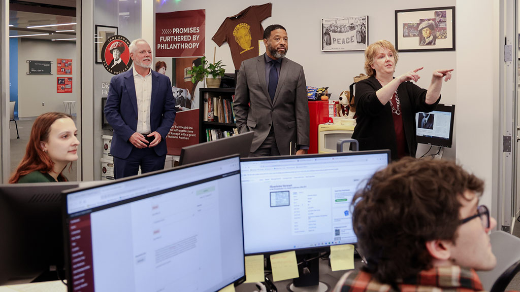 Professors in a room with Ramapo College digital Humanities students