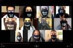 A grid of twelve people wearing black masks that say Stand Black. Each person looks at the camera, and the varied backgrounds suggest a virtual meeting format, reminiscent of innovative approaches in Theater Productions.