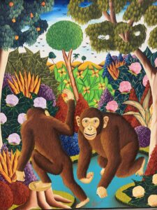Two monkeys in the center foreground with a lush, colorful jungle in the background. The monkey on the left has its back to the viewer and its left foot up on a tree stump. The monkey on the right is facing the viewer.