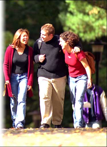 Friends walking near the arch