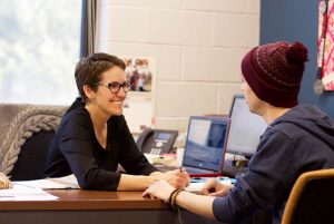 Student getting Ramapo Staff assistance