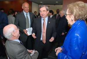 President Peter Mercer (center) and Mark Yamout '79 (left), recipient of this year's Delta Mu Delta Award, with Richard and Millicent Anisfield during the dedication of the Anisfield School of Business building.