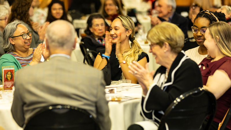 Guest siting at a table for Ramapo College's Scholarship Reception Dinner