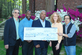 Haiti Scholarship Fund Committee member Shalom Gorewitz; Pierre Romain, founder of The Rose Foundation; committee members Ed Eloi, Lisa Lutter and Warner Wada. Each year The Rose Foundation donates $5,000 to the Haiti Scholarship Fund.