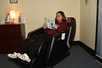 Student in massage chair