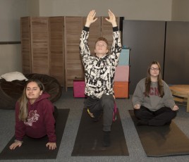 Students using yoga mats