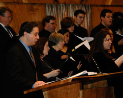 Cantor David Perper of Temple Beth Haverim Shir Shalom leading a joint rehearsal of his congregation’s adult choir and the Ramapo Chorale before the annual Kristallnacht commemoration. 