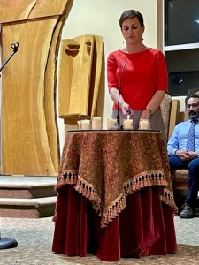 Rabbi Schwartzman lights candles