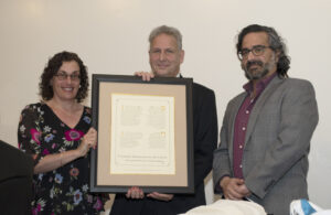 Lois Roman (MST); Peter Safirstein, Chair of the Gross Center Advisory Board, and Director Jacob Labendz