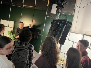 Gathering in a green movie studio