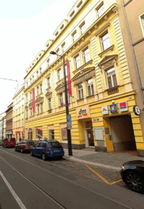 Picture of a yellow building in Art-Nouveau style. 