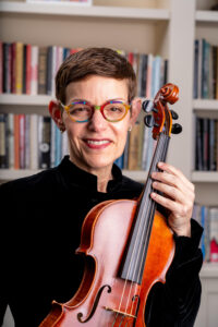 Headshot of Tamara Freeman holding her viola.