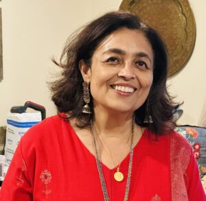 Picture of Ruma Sen in a red shirt