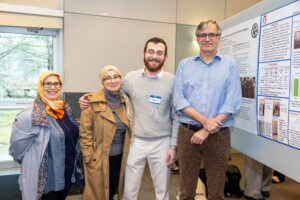 Honors Student Metin San with his Faculty Sponsor Dr. Peter Rice and his family