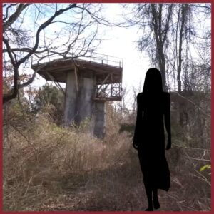 Photo of an old nike missile base and the silhouette of a women in the foreground