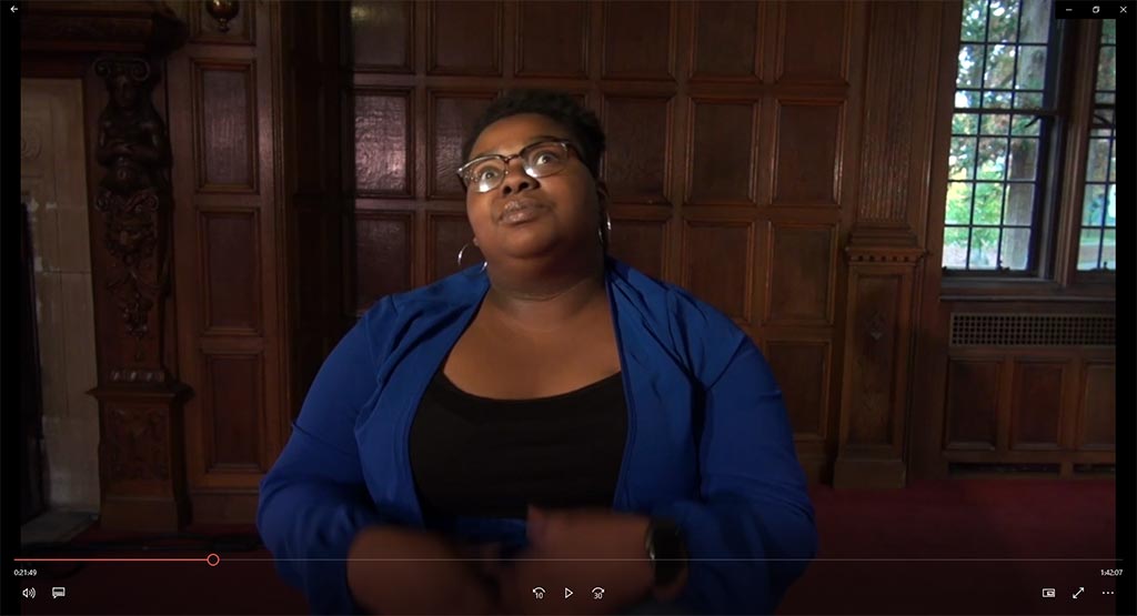 Actress poised in the York Room in the Birch Mansion on campus