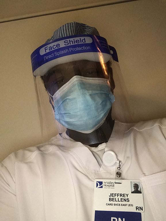Jeffrey Bellen '19 - Ramapo grad nurse wearing mask and face shield