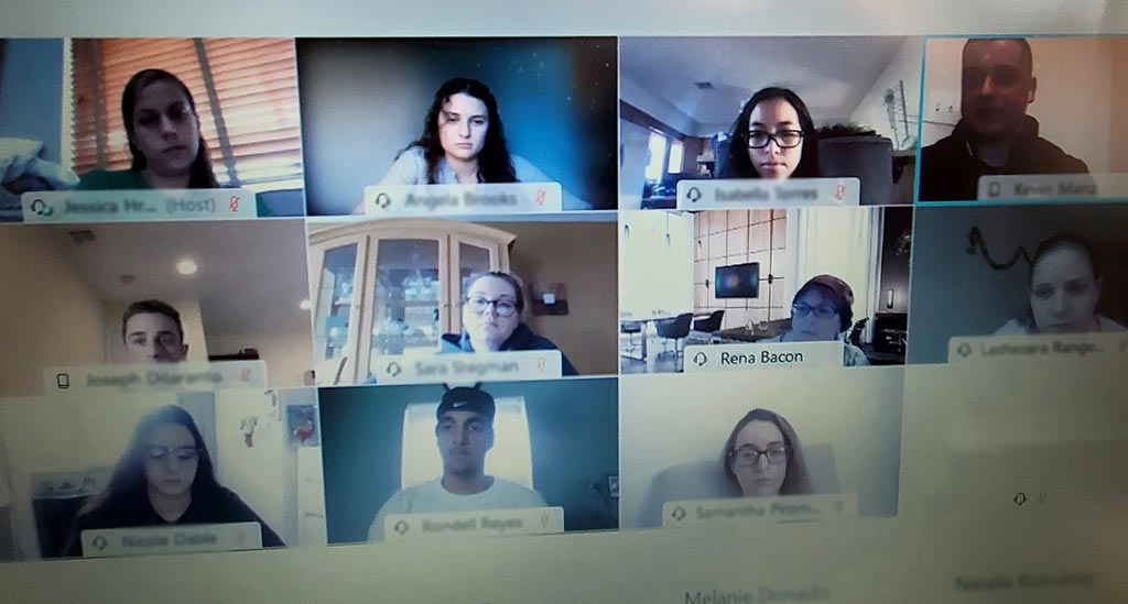 Manz-Kevin-825-web Screen shot of class listening to Kevin Manz lecture