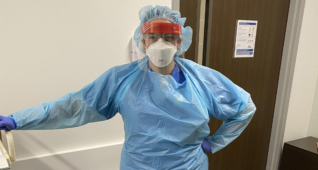 Beth Lutchen-Pharis ’09, Nurse in PPE in clinical setting