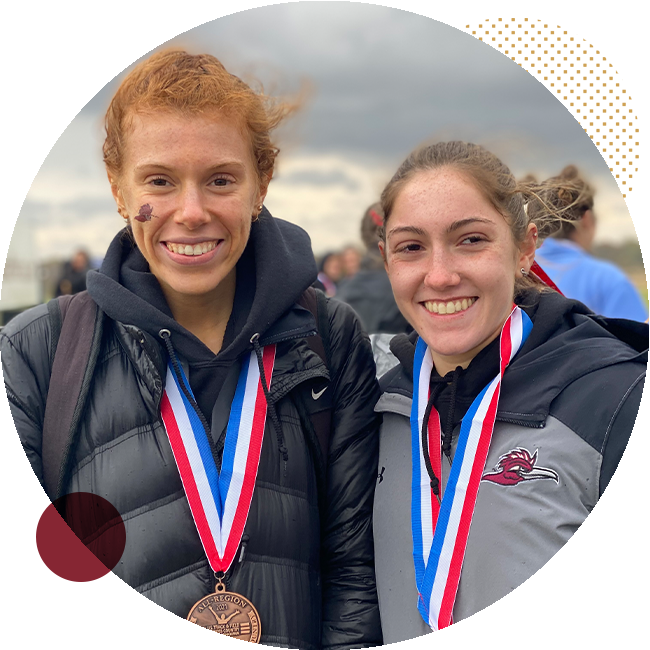 Two students pose with their medals