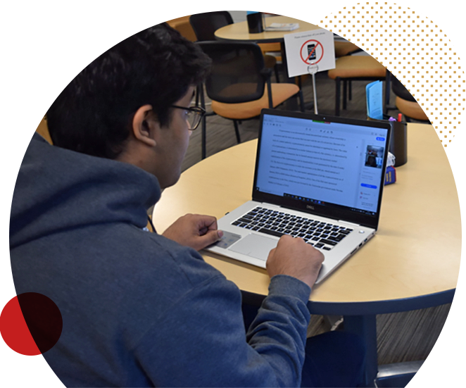 Laptops-story student using a laptop at a desk