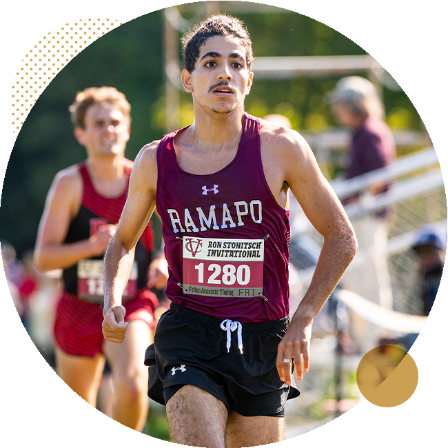 student running at cross country meet