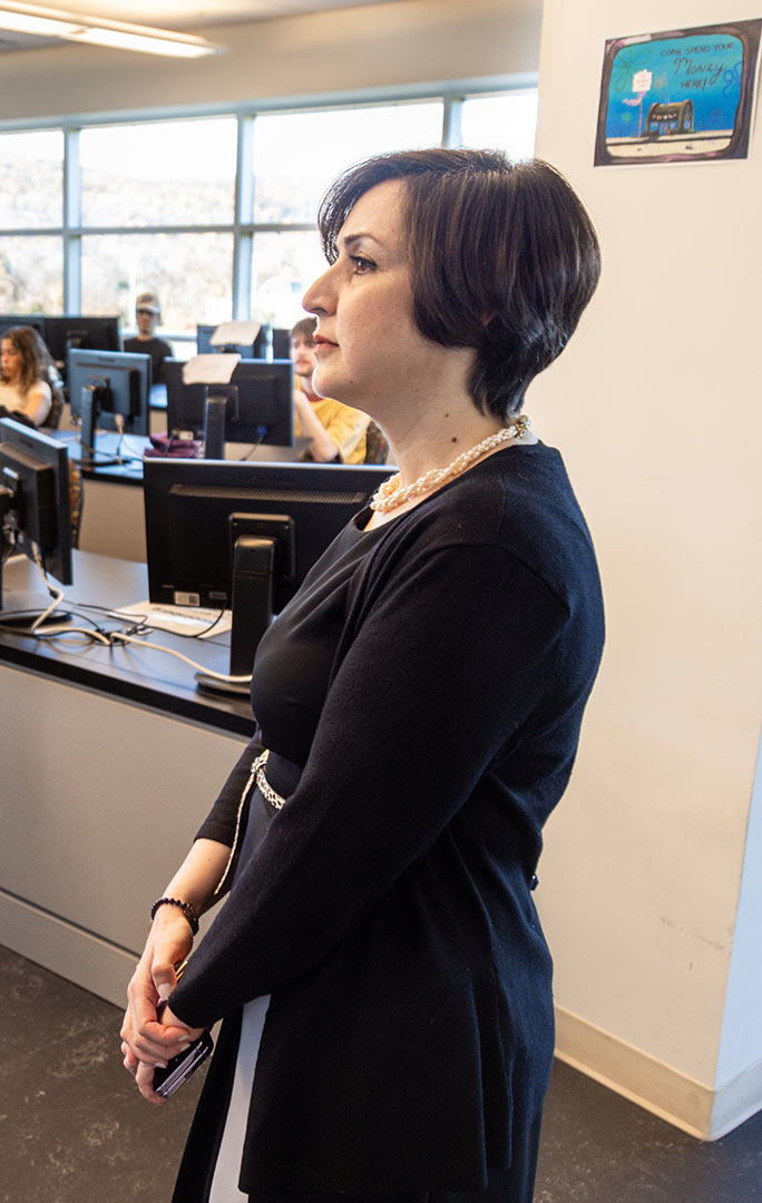 Professor Nosrati standing in a Ramapo College classroom