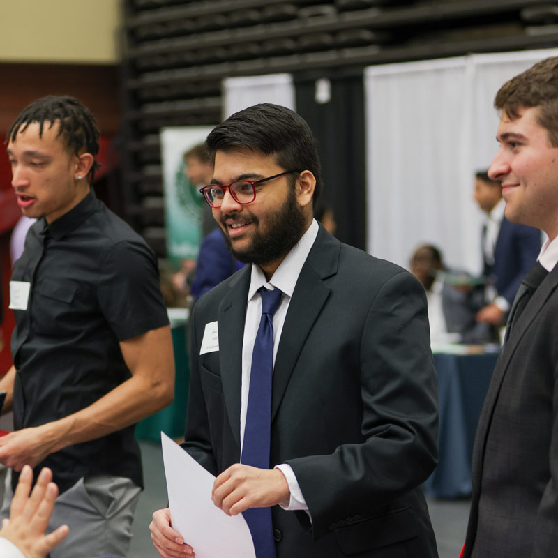 Student wearing suit during