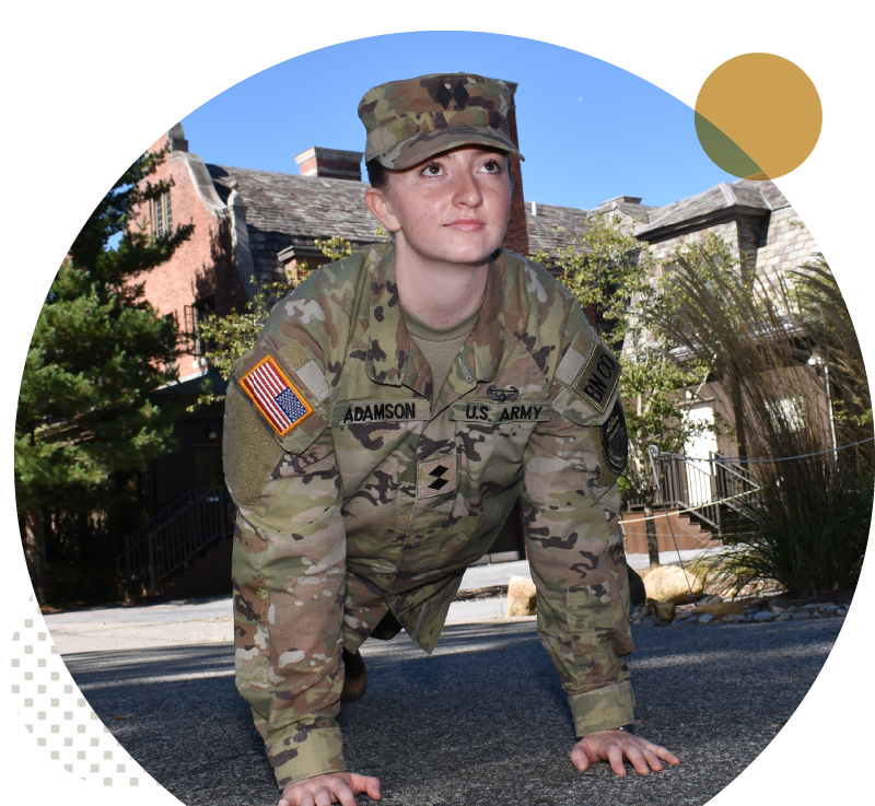 Olivia Adamson ROTC Nursing webfeature Olivia Adamson doing pushups in front of Ramapo College's Mansion