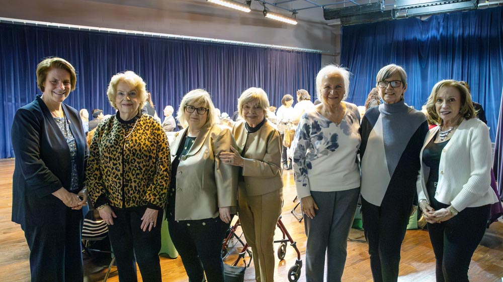 President Jebb standing, smiling with guests at the Foundation’s Performing Arts Dinners