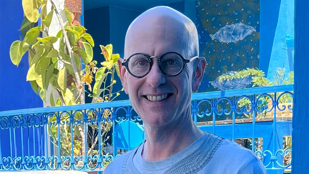 Ramapo College Literature Professor Benjamin Eric Daffron in a traditional kandura, drinking mint tea, in Café Clock in Chefchaouen in May 2024.