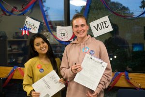 RCNJ students holding voter registration forms