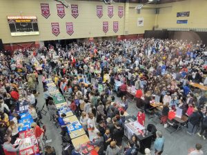 Aerial view of 2022 Bergen County College Fair showing thousands of people visiting rows of tables with information from more than 200 colleges and universities