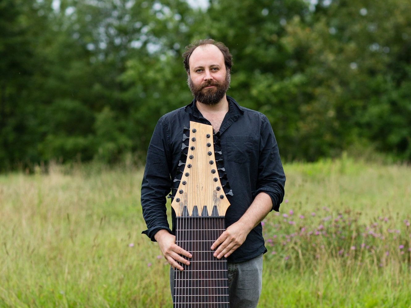 Dr. Zachary Layton, assistant professor of music production at Ramapo College, in a field