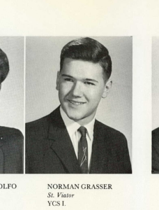Black and white yearbook photo of Norman Grasser wearing a suit and tie.
