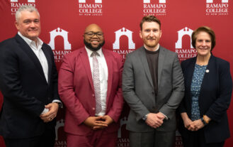 Left to right in front of an RCNJ logo backdrop: BOT Chair Albert Nieves, Trustee Stephan Lally '20, Trustee Brady O'Connor '16, RCNJ President Cindy Jebb