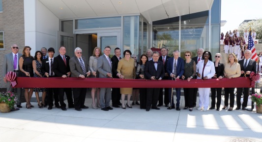 Ramapo College of New Jersey officially dedicated the Adler Center for Nursing Excellence on May 8. The 36,000-square foot center includes state-of-the-art classroom, research and simulation laboratory space, enabling students to assess patients and to determine the treatment. Ramapo’s Nursing Program currently enrolls more than 500 students. Pictured cutting the ribbon are College officials, nursing administration and U.S. Supreme Court Associate Justice Sonia Sotomayor, who offered remarks at the dedication ceremony.