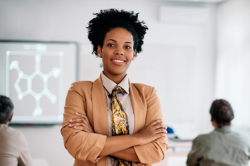 Educational leader standing in a classroom