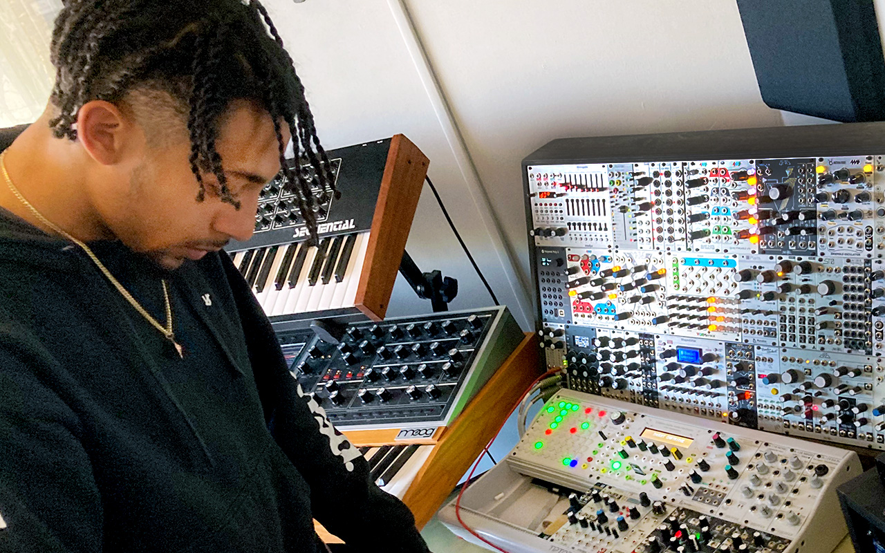 Masters student on a sound board