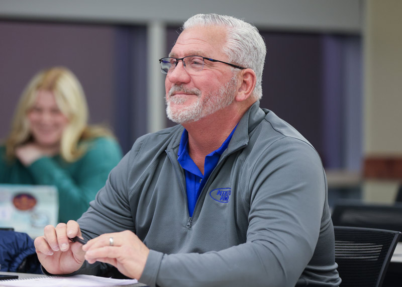 Ramapo College degree completion student sitting in class