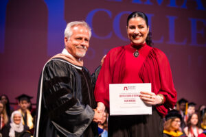 Dean Ed Petkus and International Business Award recipient Kalme Moncavo
