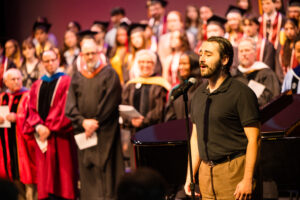 Ayden Mossmann sings the Alma Mater