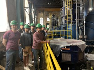 Students viewing equipment inside the Great Falls Hydroelectric Station