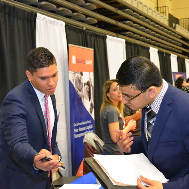 Student talking with a professional 