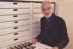 Professor Ira Spar at The Met looking over artifacts.